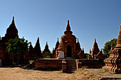 The cluster of red brick temples, named Khay-min-gha on the map on the North plain of Bagan. Myanmar. 